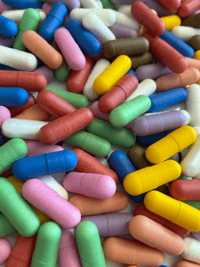 HPMC capsules coated with natural colors. mixed